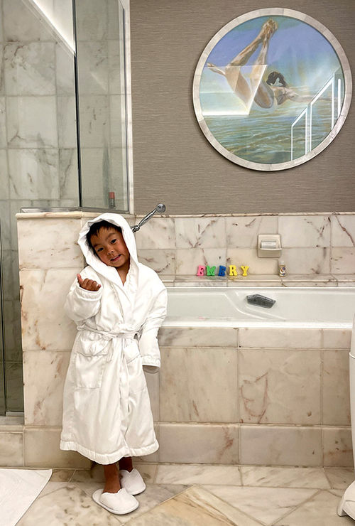 The writer's son dressed in a kid-size robe and matching slippers at the resort. The writer's son dressed in a kid-size robe and matching slippers at the resort.