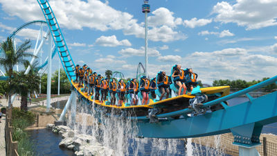 Standing riders will travel through twists and turns.