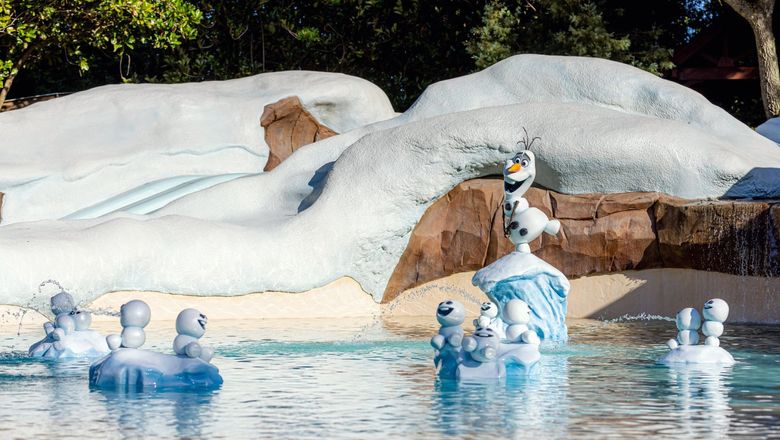 Olaf and the Snowgies in the wading pool at Blizzard Beach.