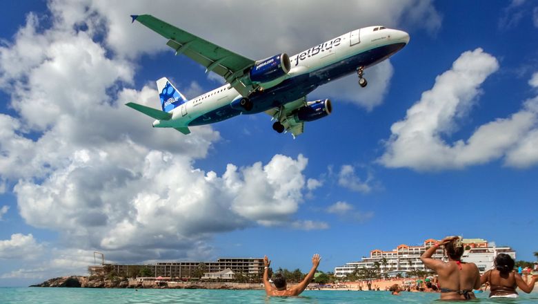 A JetBlue plane comes in for a landing in St. Maarten.