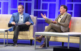 Royal Caribbean Group CEO Jason Liberty, left, spoke with Travel Weekly editor in chief Arnie Weissmann on stage at Travel Weekly's CruiseWorld 2022 event in Fort Lauderdale.
