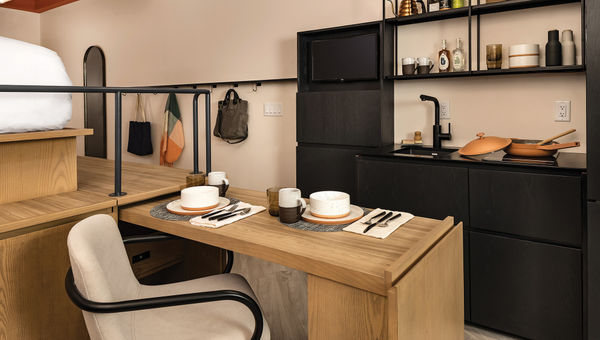 A kitchen area in a guestroom at the Catbird hotel in Denver.