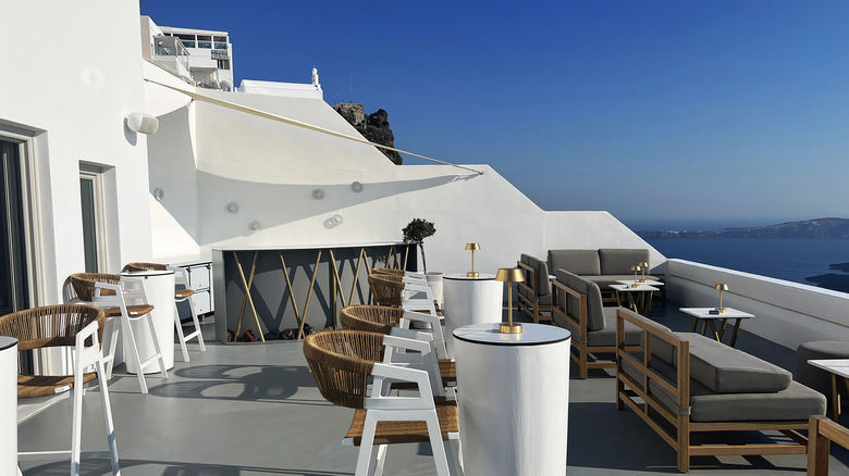 The outdoor portion of the bar at Grace Hotel, an Auberge Collection property on Santorini.