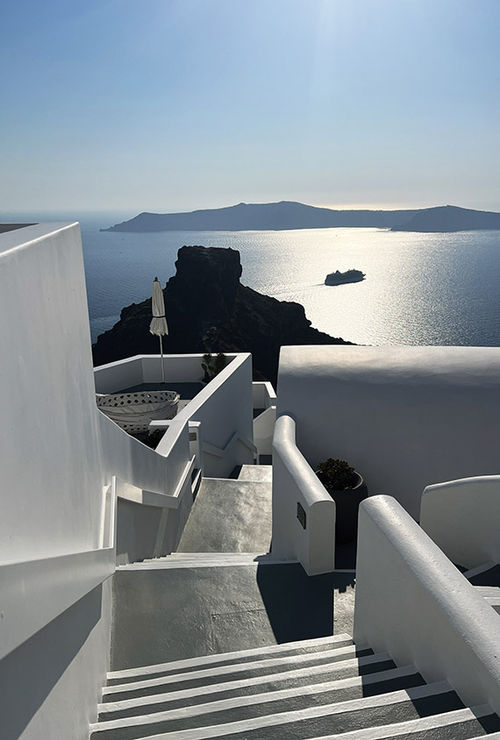 The stairs at the Grace Hotel seem to lead to Skaros Rock. The stairs at the Grace Hotel seem to lead to Skaros Rock.