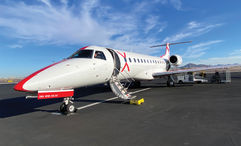 A 30-seat JSX Embraer ERJ135 on the runway in Phoenix. Flyers board from tarmac and spend just a few minutes aboard before takeoff.