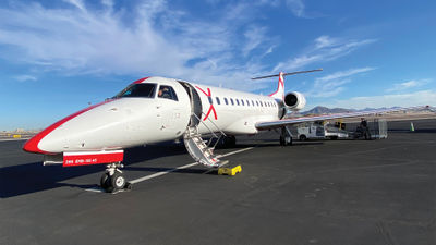 A 30-seat JSX Embraer ERJ135 on the runway in Phoenix. Flyers board from tarmac and spend just a few minutes aboard before takeoff.