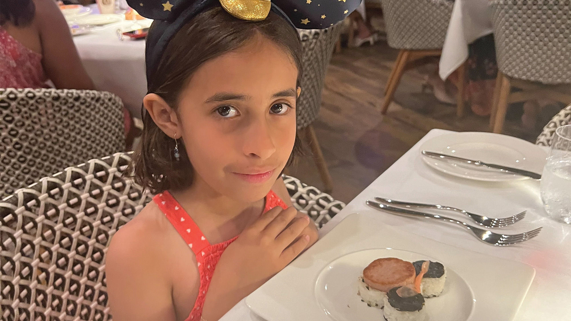 The writer's daughter liked the rice and the nori in the mouse ear musubi served at the Aulani's Ama Ama restaurant.