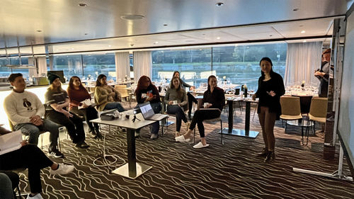 ASTA Young Professional Society members during an educational session onboard the Emerald Dawn.