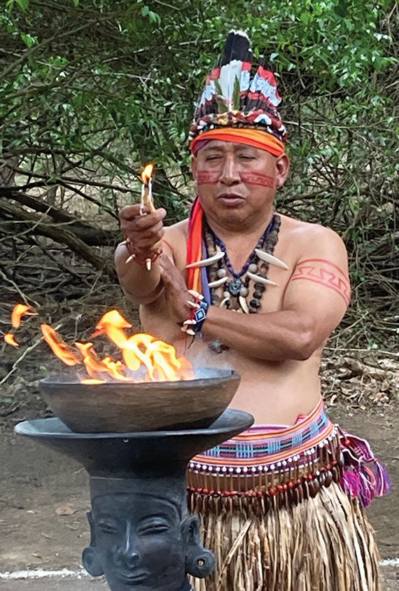 A shaman performs an ancient Manteno ritual in Agua Blanca.