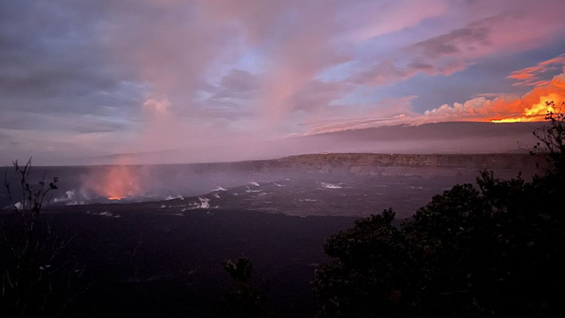 A view of the Kilauea eruption on the left and Mauna Loa eruption on the right can be seen at the Hawaii Volcanoes National Park.