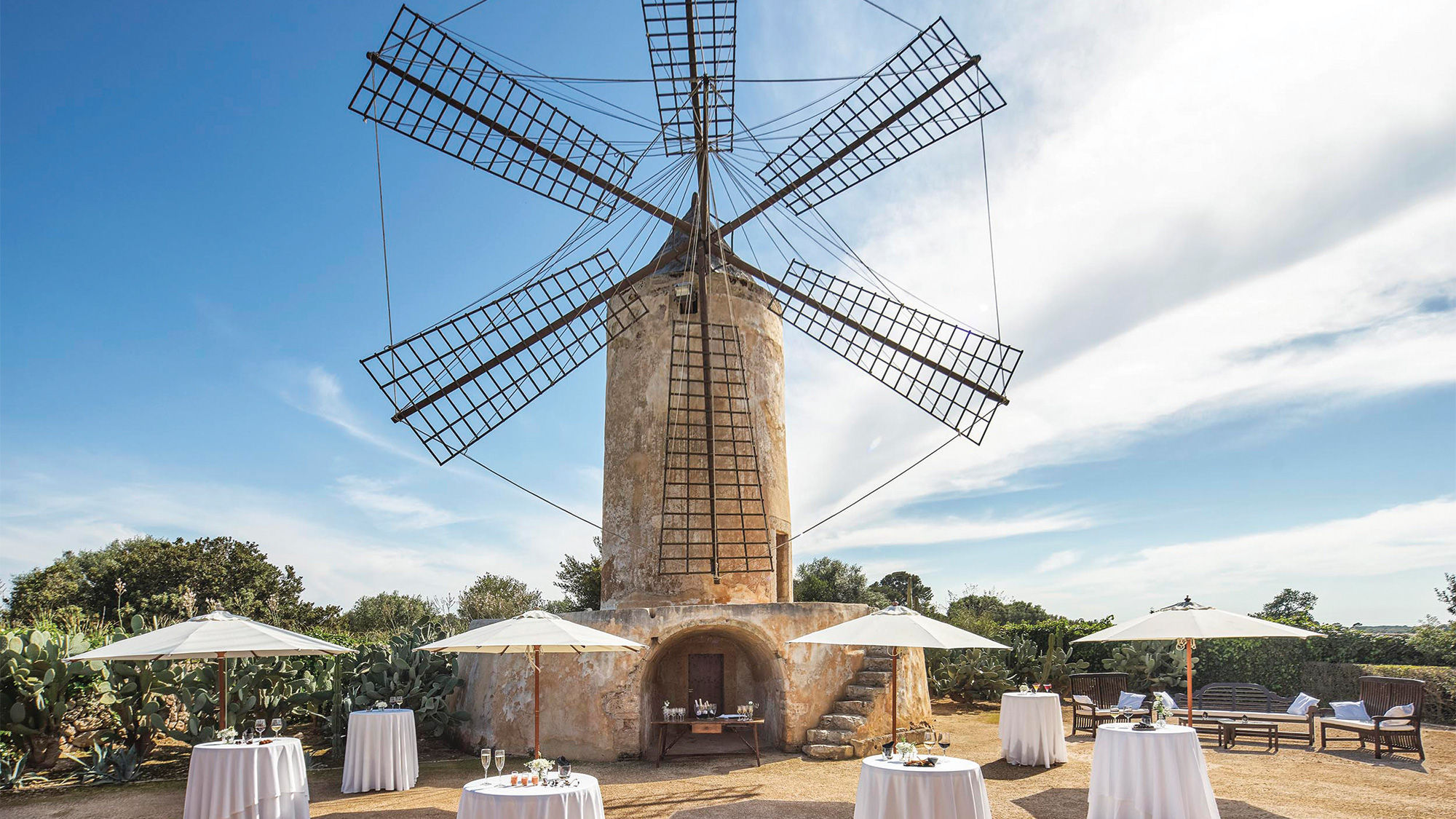 The Zoetry Mallorca's windmill is marketed as the ideal backdrop for cocktail hour at a wedding reception.