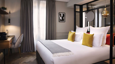 A Cozy guestroom at Maison Elle Paris.