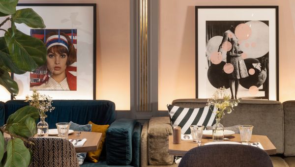 Elle magazine artwork in the breakfast restaurant at Maison Elle Paris.