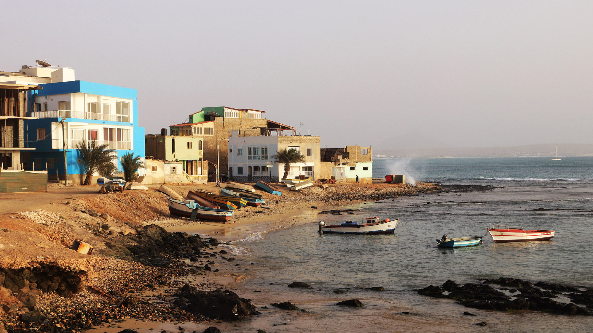 Boats along the shoreline of Boa Vista, one of the Cape Verde Islands.
