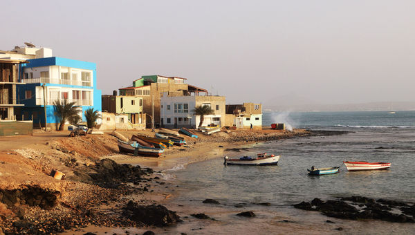 Boats along the shoreline of Boa Vista, one of the Cape Verde Islands. Boats along the shoreline of Boa Vista, one of the Cape Verde Islands.