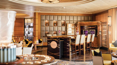 The Laurent-Perrier Champagne Bar onboard Cunard's Queen Mary 2 features Champagne tasting flights.