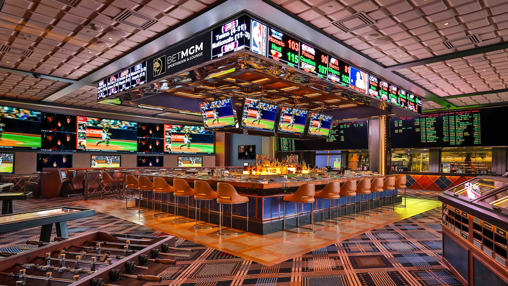The sports bar at the Cosmopolitan features LED video walls, dozens of TV screens and 23 video poker machines as well as pool tables and foosball.