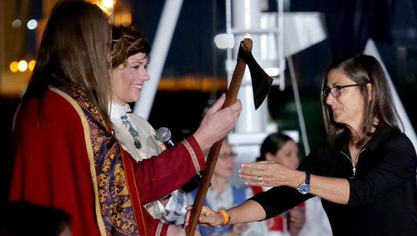 Viking Neptune godmother Nicole Stott (right) was presented a Viking broad axe to cut the ribbon to send a bottle of Norwegian crashing into the ship’s hull. Viking Neptune godmother Nicole Stott (right) was presented a Viking broad axe to cut the ribbon to send a bottle of Norwegian crashing into the ship’s hull.
