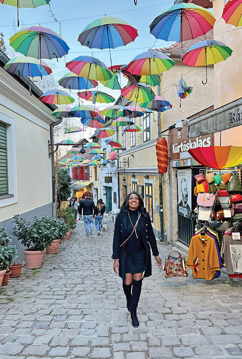 Rainbow-colored umbrellas hang in a corridor in Szentendre, an artist village near Budapest that was a stop on an Emerald Cruises sailing.