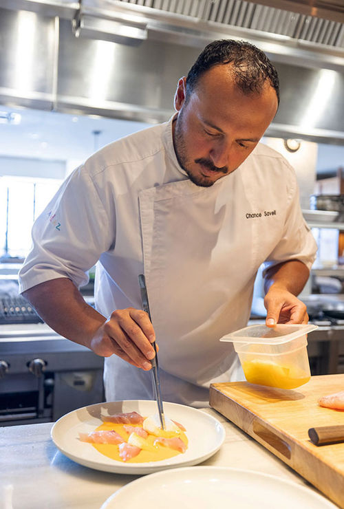 Andaz’s chef prepares the six-course meal in an intimate dining experience. Andaz’s chef prepares the six-course meal in an intimate dining experience.