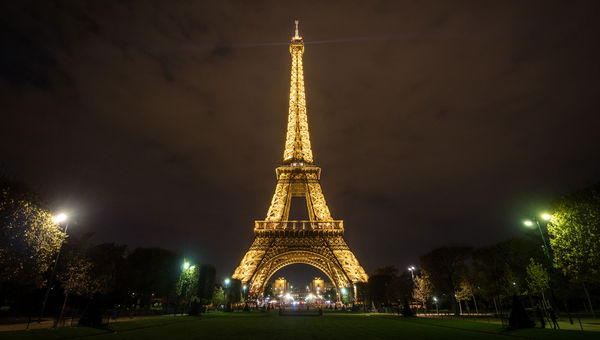 The Eiffel Tower lit up in the evening. The Eiffel Tower lit up in the evening.