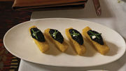 Black caviar adds a buttery sensation to the polenta sticks appetizer at Allie's Cabin.