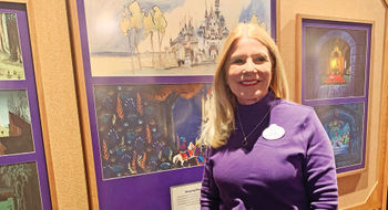 Imagineer Kim Irvine at the "Disney 100 Years of Wonder" exhibit at Disneyland.