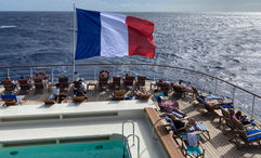 The French flag flying on the Club Med 2.