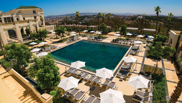 An oversize pool is the centerpiece of the outdoor space at the hotel.