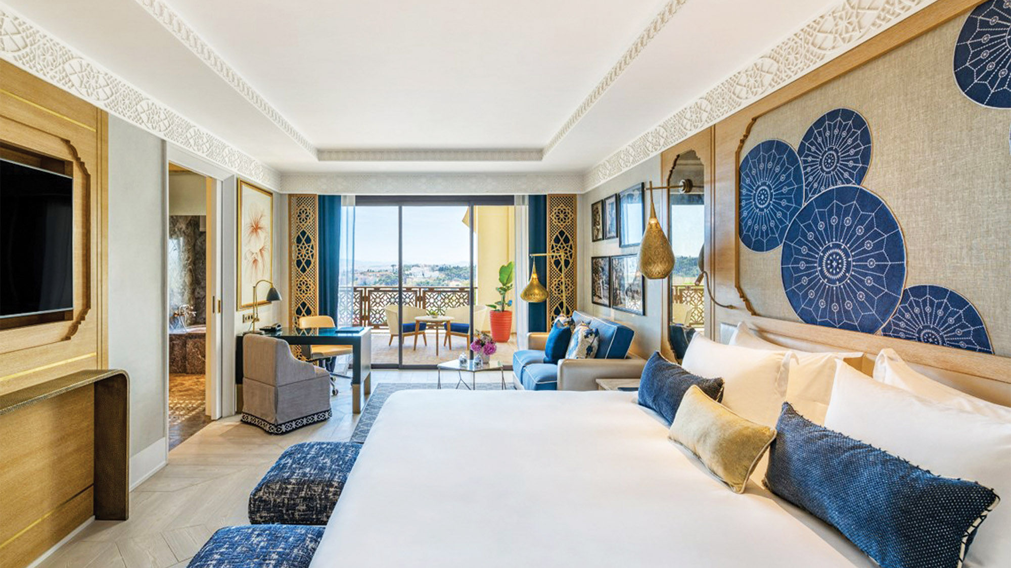The colors of the Mediterranean reflected in the design of a guestroom with a view.