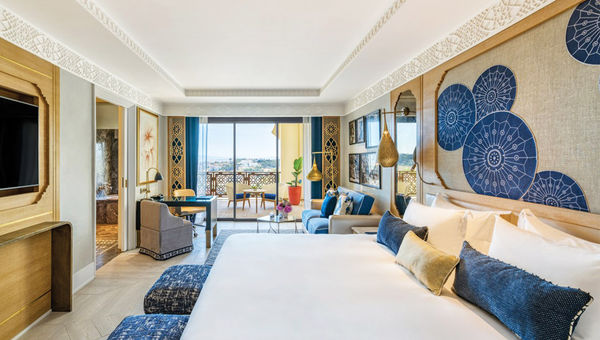 The colors of the Mediterranean reflected in the design of a guestroom with a view.