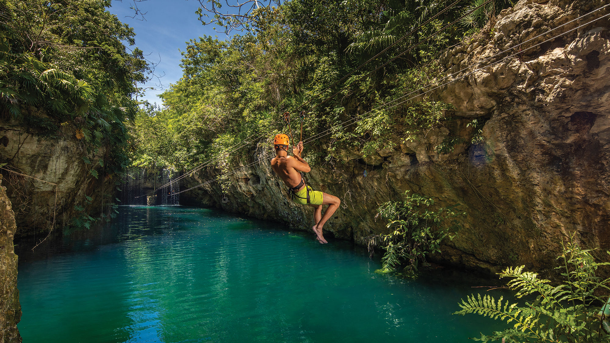 A ziplining guest at Grupo Xcaret's Xplor park.