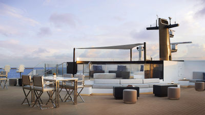 The forward Observation Terrace on Deck 10 is the highest outdoor viewpoint on the Evrima.