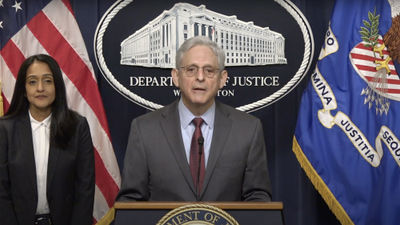 U.S. attorney general Merrick Garland announcing the DOJ's lawsuit against the JetBlue-Spirit merger.