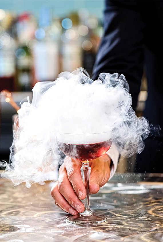 The ship's Casino Mixology Bar is focused on the art of the cocktail, such as this drink topped with a vapor-filled aromatic bubble.