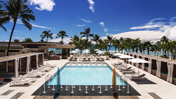 The pool at the Waikiki Beach Marriott Resort & Spa offers travelers who book up to 10,000 Marriott Bonvoy points a four-night stay.