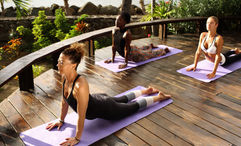 Vinyasa Flow yoga sessions are just one of the offerings during Curtain Bluff's health and wellness week, April 22 to 26