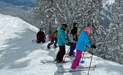 Skiers and boarders on a powder day at Utah’s Brighton Resort.