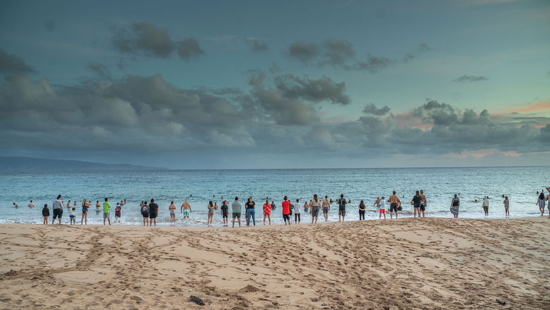 A sunrise ceremony during the Celebration of the Arts at The Ritz-Carlton Maui, Kapalua.