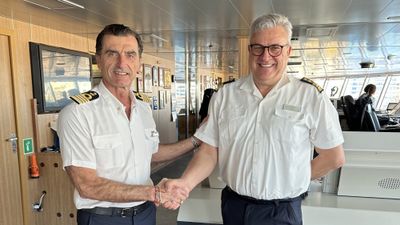 The Venezia changed hands when Capt. Tihomir Muzic (right) handed over the ship to Capt. Claudio Cupisti.