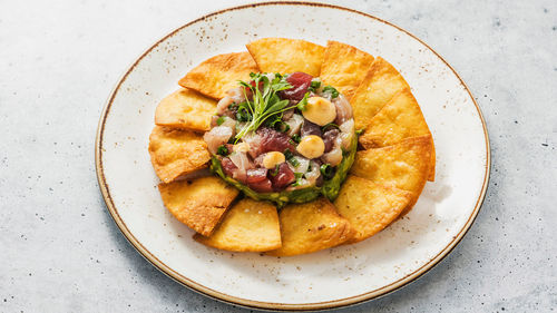 The Hapa Poke Nachos is one of Michael Babera’s favorite dishes at RumFire.