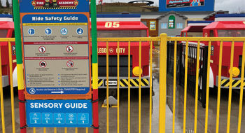 A sign at Legoland New York's Fire Academy attraction shows its sensory guide for families with autistic children.