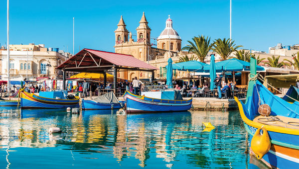 The small fishing village of Marsaxlokk in the southeastern region of the island of Malta.