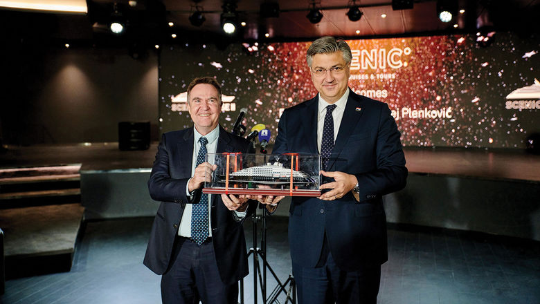 Scenic founder and CEO Glen Moroney, left, and Croatian prime minister Andrej Plenkovic hold a model of the Scenic Eclipse II.