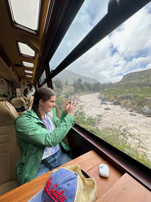 Riding Inca Rail through the Sacred Valley from Ollantaytambo to Machu Picchu. Inkaterra staff members meet every arriving guest at the station.