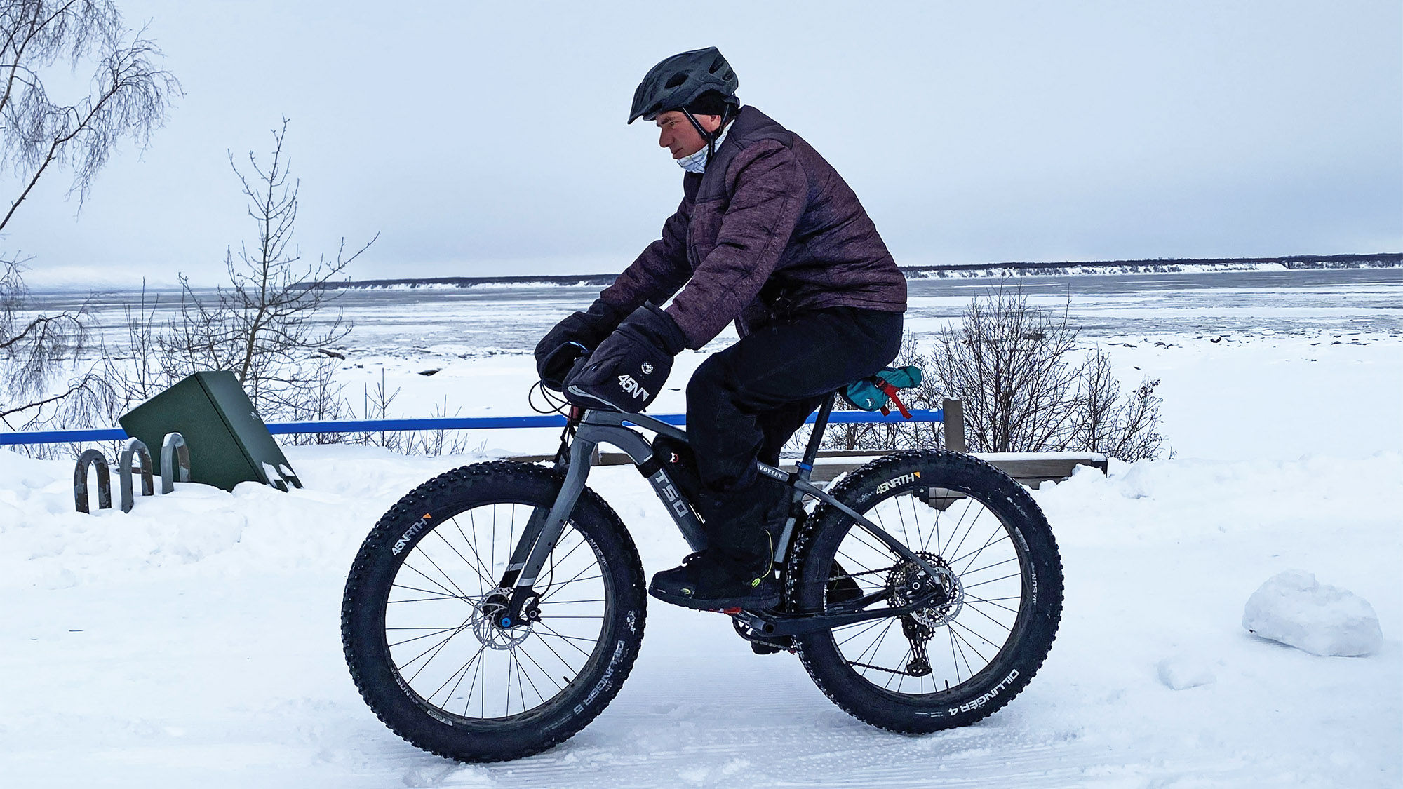 Alaska Bike Adventures in Anchorage offers fat tire bike rides, even in the snow and ice. Here, the author rides along the Cook Inlet on Anchorage's Coastal Trail.