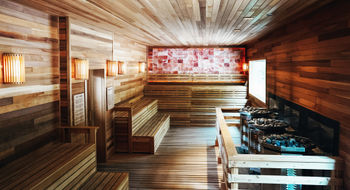 The resort's spacious Finnish sauna, featuring salt-lined walls, is one of the highlights of the Alyeska Nordic Spa.
