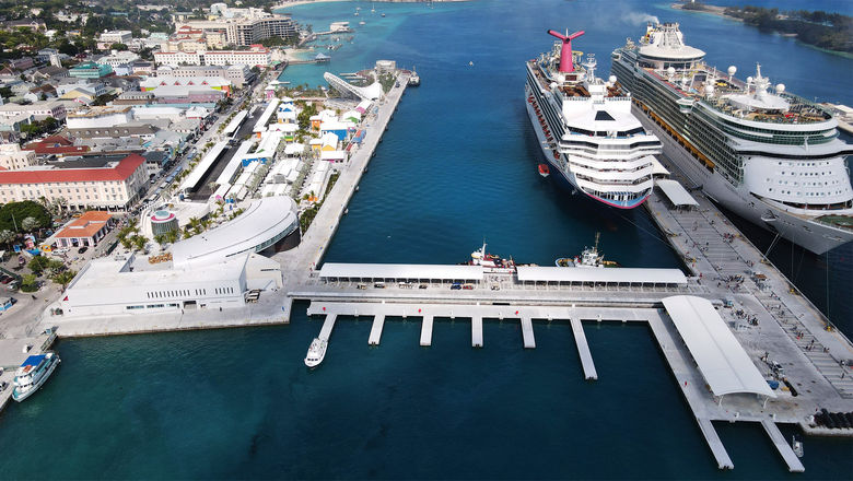 Carnival and Royal Caribbean ships docked at the redeveloped cruise port in Nassau, Bahamas.