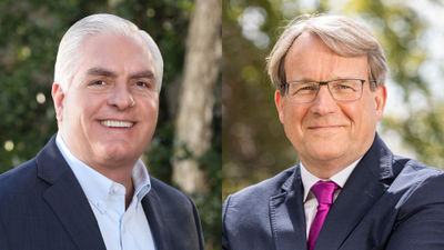 Outgoing BCD Travel CEO John Snyder (left) and his successor, Stephan Baars.