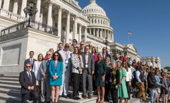 A group of delegates from US Travel's Destination Capitol Hill fly-in event in April gather on the Capitol steps.